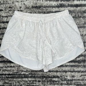 White animal print athletic shorts